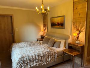 Postel nebo postele na pokoji v ubytování Ferienapartment Residenz "Weisses Rössl am See"