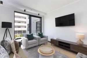 Μια τηλεόραση ή/και κέντρο ψυχαγωγίας στο Portswood 103 by Host Agents