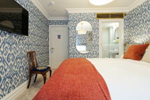Cama ou camas em um quarto em Old Town House by Ezestays
