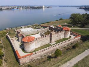an aerial view of a castle by the water at Seoska kuca Stojanović in Kladovo