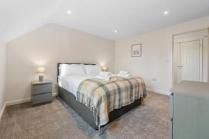 Katil atau katil-katil dalam bilik di New Apartment in Stockton, sleeps 4, Free WIFI