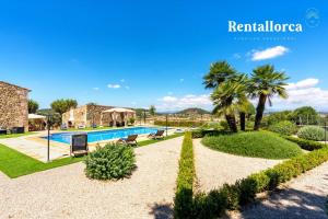 een afbeelding van een villa met zwembad bij Cases de Son Roig by Rentallorca in Sant Joan