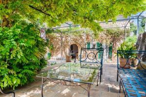 A garden outside Finca Can Busquera by Rentallorca