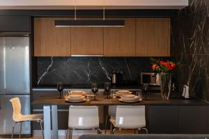 Ett kök eller pentry på Valentinos Apartments