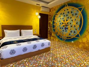 Postel nebo postele na pokoji v ubytování Rudra Sahashrara Bali - Ayurvedic - Health and Wellness Resort