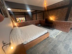 Giường trong phòng chung tại TRIBECA BEACH CASA BONITA