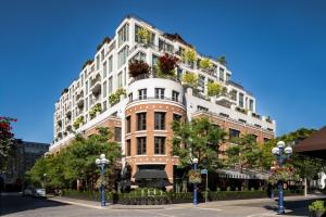 a large building with lots of plants on it at The Hazelton Hotel in Toronto