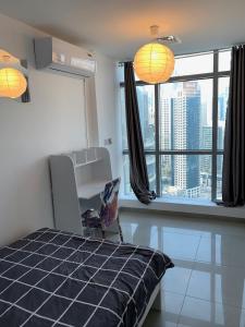 ThePenthouse Coliving II客房内的一张或多张床位