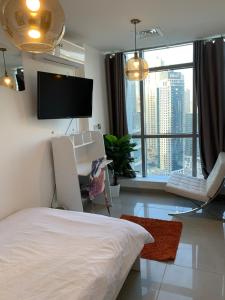 ThePenthouse Coliving II客房内的一张或多张床位