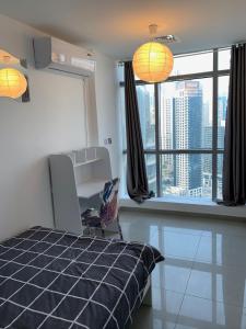ThePenthouse Coliving II客房内的一张或多张床位