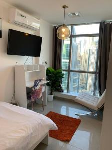 ThePenthouse Coliving II客房内的一张或多张床位