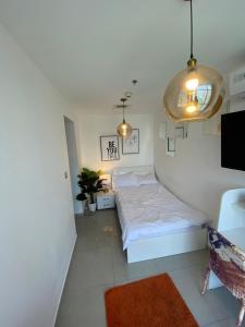 ThePenthouse Coliving II客房内的一张或多张床位