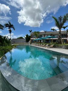 Bazén v ubytování Rudra Sahashrara Bali - Ayurvedic - Health and Wellness Resort nebo v jeho okolí