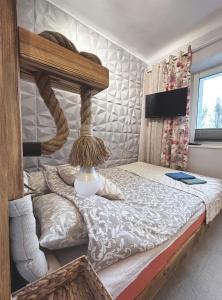 En eller flere senge i et værelse på Warszawa pokój For You