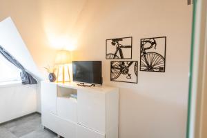 TV a/nebo společenská místnost v ubytování Residenz - Pedelec - Penthouse - Sauna - Parkplatz
