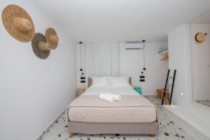 Posteľ alebo postele v izbe v ubytovaní My Comfy Windmills Apartment