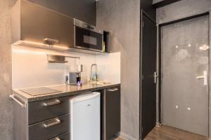Η κουζίνα ή μικρή κουζίνα στο Studio located on the Grand Place! +5 φωτογραφίες