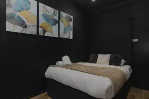 Postel nebo postele na pokoji v ubytování Amsterdam Hotel
