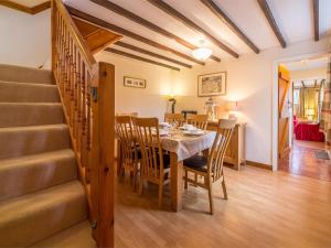 a dining room with a table and chairs at 3 bed property in Sedgeford KT092 in Sedgeford