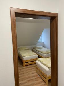 Postel nebo postele na pokoji v ubytování TVM Ostrava 1