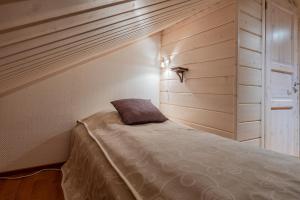 Postel nebo postele na pokoji v ubytování Villa Oo-la-laa by Hi Ylläs