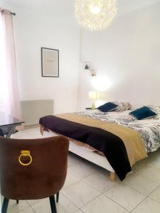 Llit o llits en una habitació de Maison Mariese - Montaudran - 2 chambres
