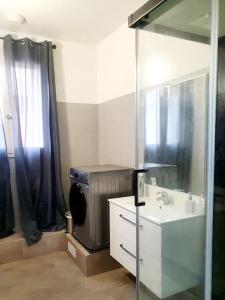 Et badeværelse på Maison Mariese - Montaudran - 2 chambres