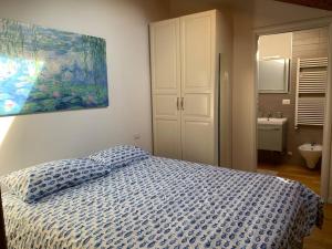 Ένα ή περισσότερα κρεβάτια σε δωμάτιο στο Casa Farini - San Giovanni in Persiceto +10 φωτογραφίες