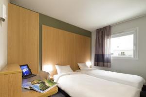 Postel nebo postele na pokoji v ubytování B&B HOTEL Perpignan Sud Marché International + 35 fotografií