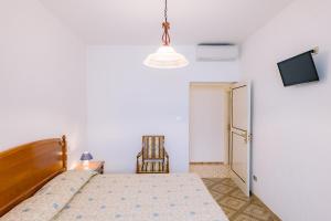 Кровать или кровати в номере Hotel Toro
