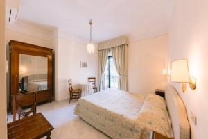 Кровать или кровати в номере Hotel Toro
