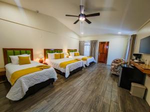 Ένα ή περισσότερα κρεβάτια σε δωμάτιο στο Sibu Boutique Hotel