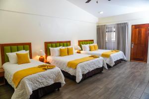 Ένα ή περισσότερα κρεβάτια σε δωμάτιο στο Sibu Boutique Hotel