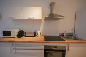 Kuchyňa alebo kuchynka v ubytovaní Equipped apartment premium location