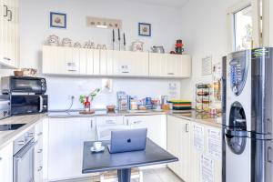 Köök või kööginurk majutusasutuses Capperi !! Holiday Rentals