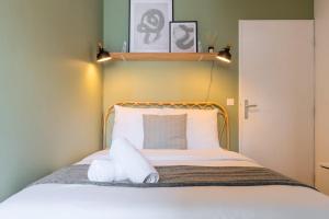 Posteľ alebo postele v izbe v ubytovaní Europe/Flandres stations apartment with balcony!