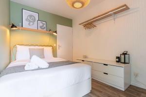 Posteľ alebo postele v izbe v ubytovaní Europe/Flandres stations apartment with balcony!