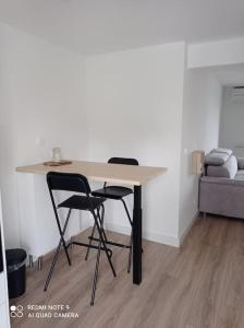 Posezení v ubytování Studio avec terrasse