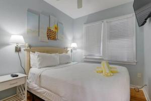 Letto o letti in una camera di Poolside Suite