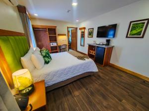 Ένα ή περισσότερα κρεβάτια σε δωμάτιο στο Sibu Boutique Hotel