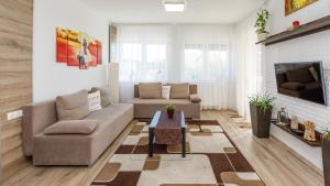 Posezení v ubytování Kendosz Apartman