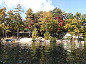 a house on the shore of a lake at Squam Lake 3 bed plus 3 bath rental (Suite 7) in Holderness