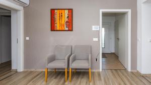 Posezení v ubytování Kendosz Apartman
