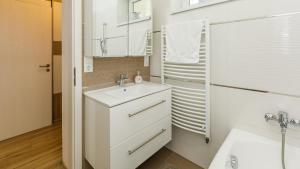 Koupelna v ubytování Kendosz Apartman + 24 fotografií