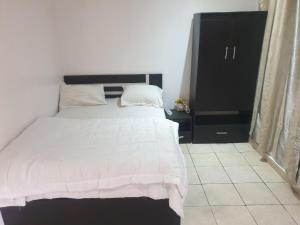 Postel nebo postele na pokoji v ubytování Vee homes