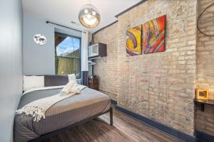 Postel nebo postele na pokoji v ubytování McCormick Place Guest House + 24 fotografií