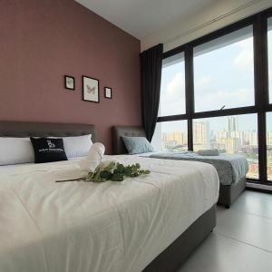 Voodi või voodid majutusasutuse New 2BR / 3BR Serenity Homestay @ Urban Suite toas