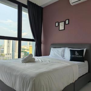 מיטה או מיטות בחדר ב-New 2BR / 3BR Serenity Homestay @ Urban Suite