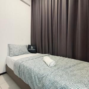 מיטה או מיטות בחדר ב-New 2BR / 3BR Serenity Homestay @ Urban Suite