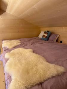 Voodi või voodid majutusasutuse Region de Gstaad - Ultra Modern Apartment- Huge Roof Terrace - Great Views toas